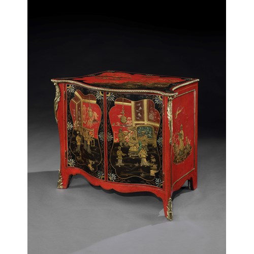 A Ormolu mounted scarlet japanned commode